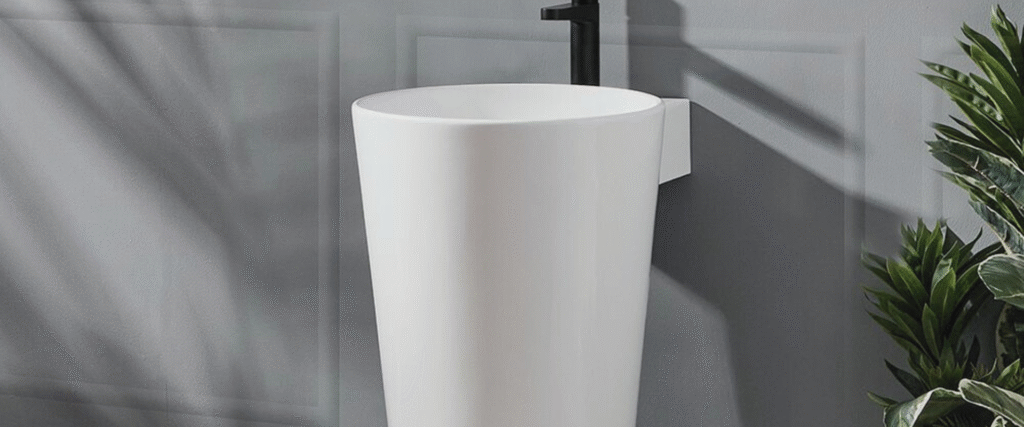 White pedestal basin in heritage Sydney bathroom
